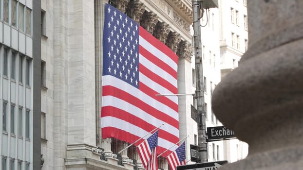 New York City, United States - 9 Sept 2023: Manhattan Downtown Financial District. Wall street. Exchange and Broad corner sign. Stock Exchange, USA Stock Market. Crossroad intersection. American flag.