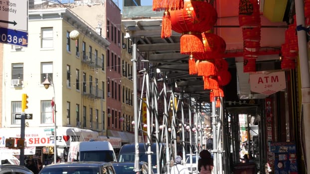 New York City, United States - 14 Sept 2023: Manhattan Chinatown Mott street, chinese ethnic district buildings architecture, USA. Red round paper lanterns, people and hieroglyph signs. Little China.