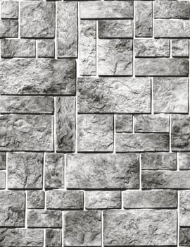Seamless texture of a grey stone wall, creating a tileable background ideal for various design applications