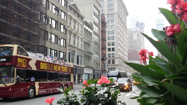 New York City, United States - 8 Sept 2023: Manhattan Midtown Broadway, 23 street, 5 avenue crossroad intersection. Worth Square near Madison Park and Flatiron Building, USA. People. Yellow taxi car
