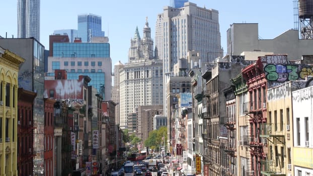 New York City, United States - 14 Sept 2023: Manhattan Chinatown East Broadway street, chinese ethnic district architecture, little Fuzhou, USA. World trade Center tower in Downtown. Manhattan Bridge.