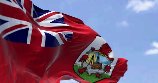 3D render of the Bermudian flag featuring the Red Ensign and coat of arms with red lion, symbolizing pride, identity, and British heritage over the North Atlantic.