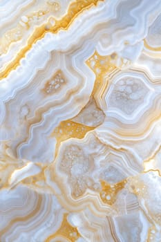 A close-up view of stunning light grey agate with beautiful golden veins, showcasing intricate patterns and textures. Perfect for backgrounds, design, and creative projects.