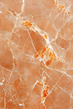 A realistic brown marble background featuring vibrant orange veins and high detail, perfect for adding a luxurious and organic texture to design projects.