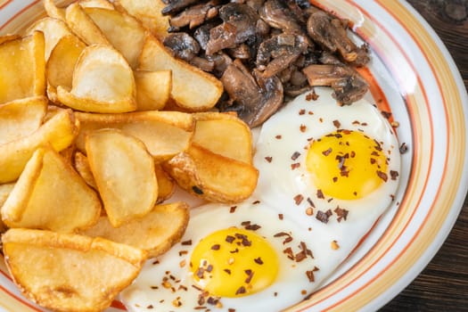 A hearty breakfast dish with crisp dippers, runny eggs, and sauteed mushrooms
