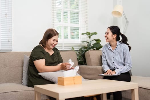 Laughter and sharing fills the room as a patient opens up about a positive moment, fostering a joyful and healing environment in therapy.