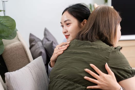 In a comforting environment, a therapist embraces her client, offering emotional support and understanding in a moment of vulnerability.