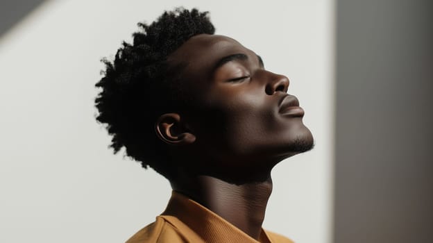 Close-up portrait of stylish black young man, handsome African male model with closed eyes, sleek, minimalist white background, studio shot photography