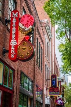 October 13, 2023, Nashville, TN: Shop and bar signs in downtown Nashville at daylight