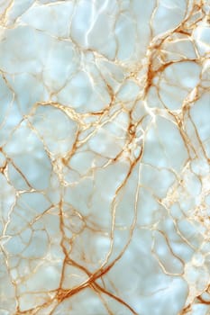 A detailed close-up of light blue marble background with intricate golden veins running through the stone, creating a beautiful and elegant pattern.