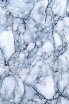 A realistic close-up of white marble with intricate gray and black veining, creating a stylish, elegant background for design, decor, and luxury themes.
