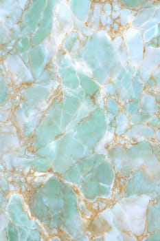 A stunning close-up view of a marble background with soothing green hues and golden veins running through the cracks. Perfect for luxury designs, home decor, or texture-based projects.