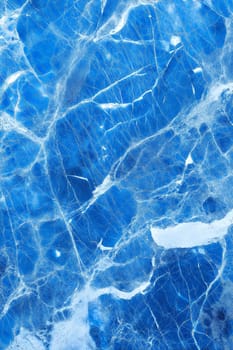 A vibrant blue marble background with striking white veins and intricate patterns. Perfect for use in design, luxury branding, and decor themes.