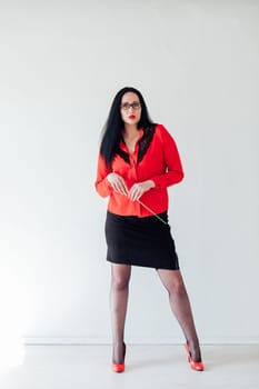 Brunette Teacher in Red Business Suit with Pointer on White Background