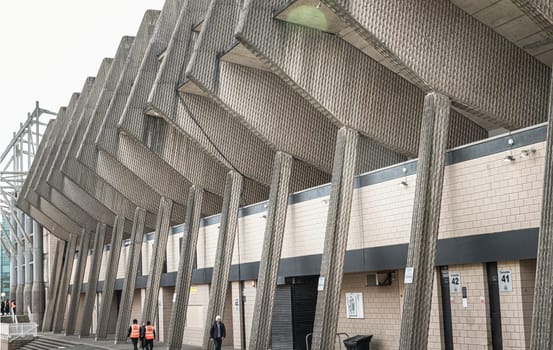 Newcastle, UK - Apr 13, 2025 - Architecture exterior view of St James' Park stadium is home to stadium of Newcastle United soccer club. use it as your Wallpaper, Poster and Space for text, Selective focus.