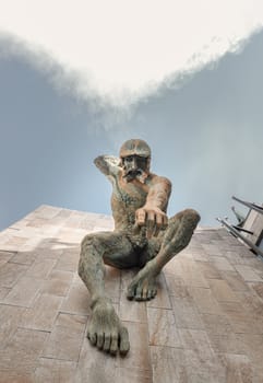 Newcastle, UK - Apr 14, 2025 - Look up at River God Tyne sculpture is mounted on an external wall of The Newcastle Civic Centre Building at Newcastle Upon Tyne. use it as your Wallpaper, Poster and Space for text, Selective focus.