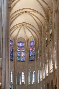 Paris, France - February 22nd 2025 : visitors in The Notre-Dame de Paris, newly re-opened cathedral restored after reconstruction, details of exterior