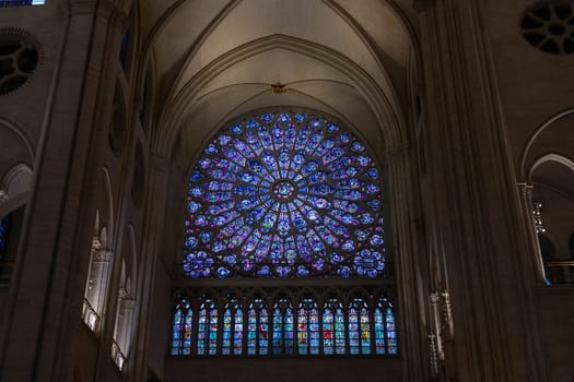 Paris, France - February 22nd 2025 : visitors in The Notre-Dame de Paris, newly re-opened cathedral restored after reconstruction, details of exterior
