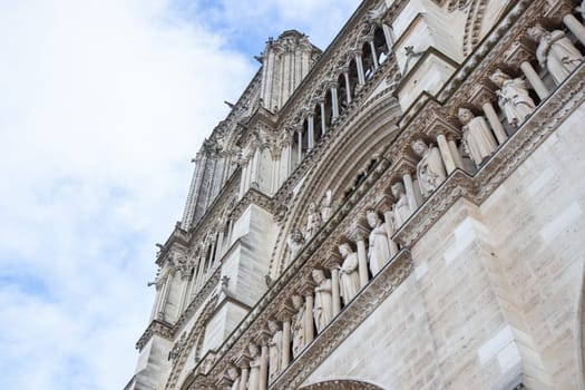 Paris, France - February 22nd 2025 : The Notre-Dame de Paris, newly re-opened cathedral restored after reconstruction, details of exterior