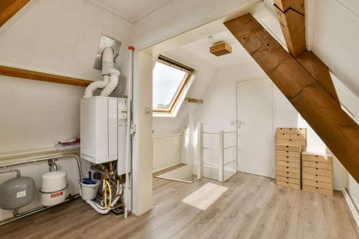 A cozy room featuring wooden beams, bright sunlight through a skylight, and minimalist storage solutions with clean lines. Ideal for contemporary living.