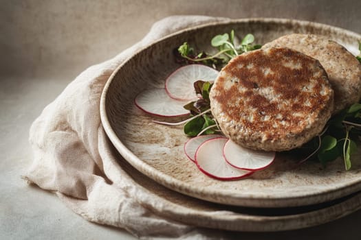 Plant-based protein patties rest on vibrant sprouted greens, adorned with thin radish slices. Soft shadows enhance the delicate textures, creating a tranquil and inviting atmosphere.