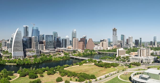 Aerial panoramic skyline of Austin Texas from Butler Metro Park with latest construction with view downriver