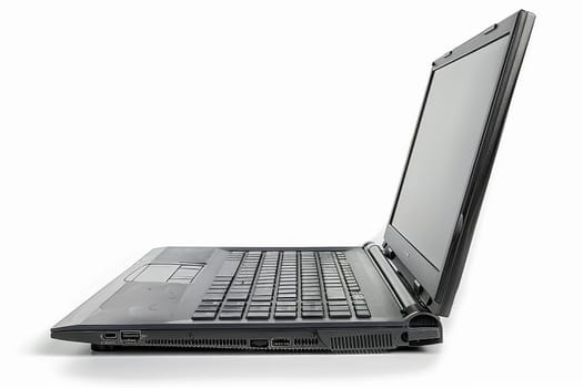 A modern, slim laptop stands open and ready for use against a stark white background, awaiting input.