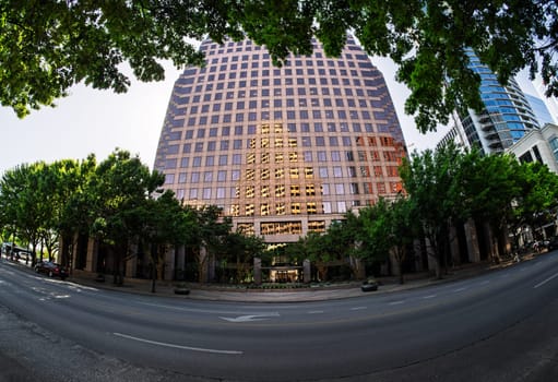 Austin, TX - 10 April 2025: Fisheye lens view of 100 Congress building in downtown Austin Texas in spring