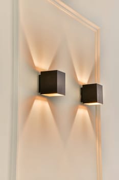 Stylish modern wall sconces provide ambient lighting with a sleek design, enhancing interior spaces. Ideal for contemporary home decor.