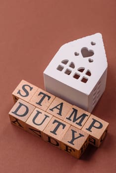 Stamp duty tax, property investment concept, business processes related to real estate. Stamp duty inscription as a background for business design