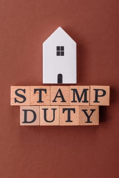 Stamp duty tax, property investment concept, business processes related to real estate. Stamp duty inscription as a background for business design