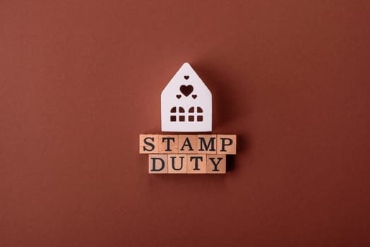 Stamp duty tax, property investment concept, business processes related to real estate. Stamp duty inscription as a background for business design