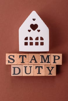 Stamp duty tax, property investment concept, business processes related to real estate. Stamp duty inscription as a background for business design