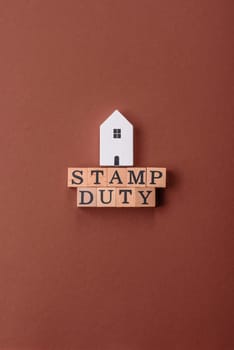 Stamp duty tax, property investment concept, business processes related to real estate. Stamp duty inscription as a background for business design