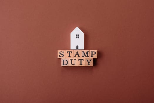 Stamp duty tax, property investment concept, business processes related to real estate. Stamp duty inscription as a background for business design