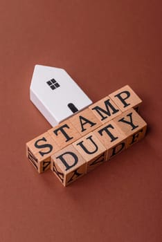 Stamp duty tax, property investment concept, business processes related to real estate. Stamp duty inscription as a background for business design