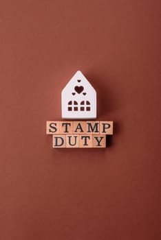 Stamp duty tax, property investment concept, business processes related to real estate. Stamp duty inscription as a background for business design