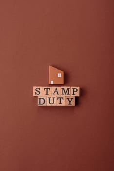 Stamp duty tax, property investment concept, business processes related to real estate. Stamp duty inscription as a background for business design