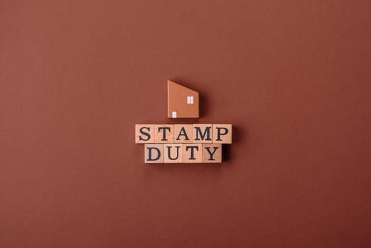 Stamp duty tax, property investment concept, business processes related to real estate. Stamp duty inscription as a background for business design
