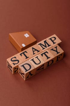 Stamp duty tax, property investment concept, business processes related to real estate. Stamp duty inscription as a background for business design