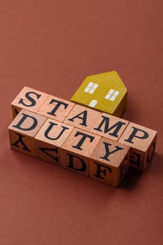 Stamp duty tax, property investment concept, business processes related to real estate. Stamp duty inscription as a background for business design