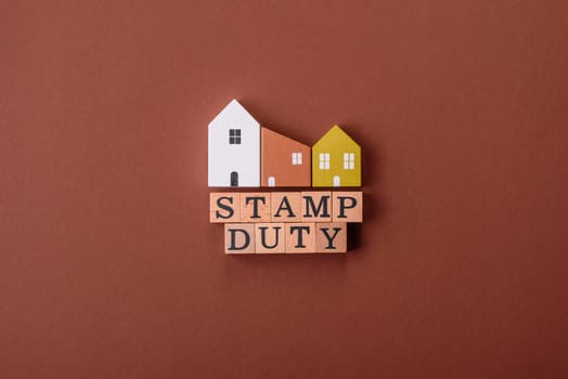 Stamp duty tax, property investment concept, business processes related to real estate. Stamp duty inscription as a background for business design