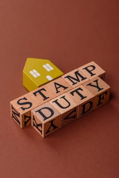 Stamp duty tax, property investment concept, business processes related to real estate. Stamp duty inscription as a background for business design