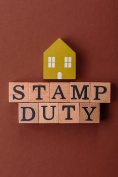 Stamp duty tax, property investment concept, business processes related to real estate. Stamp duty inscription as a background for business design