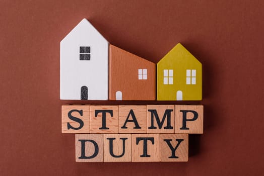 Stamp duty tax, property investment concept, business processes related to real estate. Stamp duty inscription as a background for business design