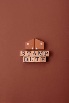 Stamp duty tax, property investment concept, business processes related to real estate. Stamp duty inscription as a background for business design