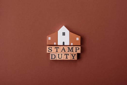 Stamp duty tax, property investment concept, business processes related to real estate. Stamp duty inscription as a background for business design