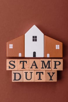 Stamp duty tax, property investment concept, business processes related to real estate. Stamp duty inscription as a background for business design