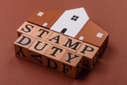 Stamp duty tax, property investment concept, business processes related to real estate. Stamp duty inscription as a background for business design