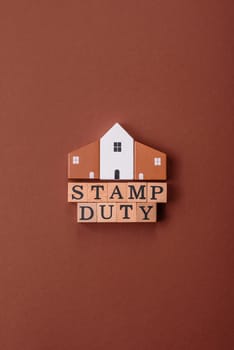Stamp duty tax, property investment concept, business processes related to real estate. Stamp duty inscription as a background for business design